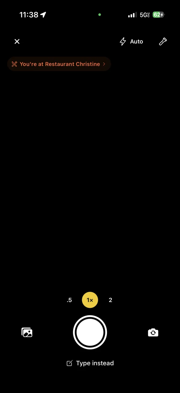 Dishiary iPhone camera logging screen with a restaurant context chip, camera shutter, photo import, and type-instead control